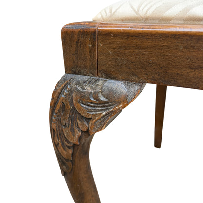 Top-down view of burr veneer table surface and removable central leaf