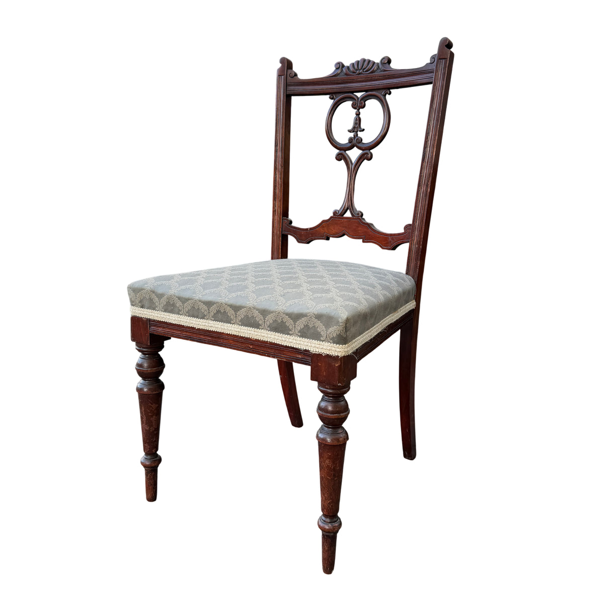 Antique Edwardian mahogany dining chair with pierced carved back and grey patterned upholstered seat, front view
