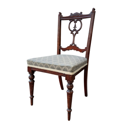 Antique Edwardian mahogany dining chair with pierced carved back and grey patterned upholstered seat, front view