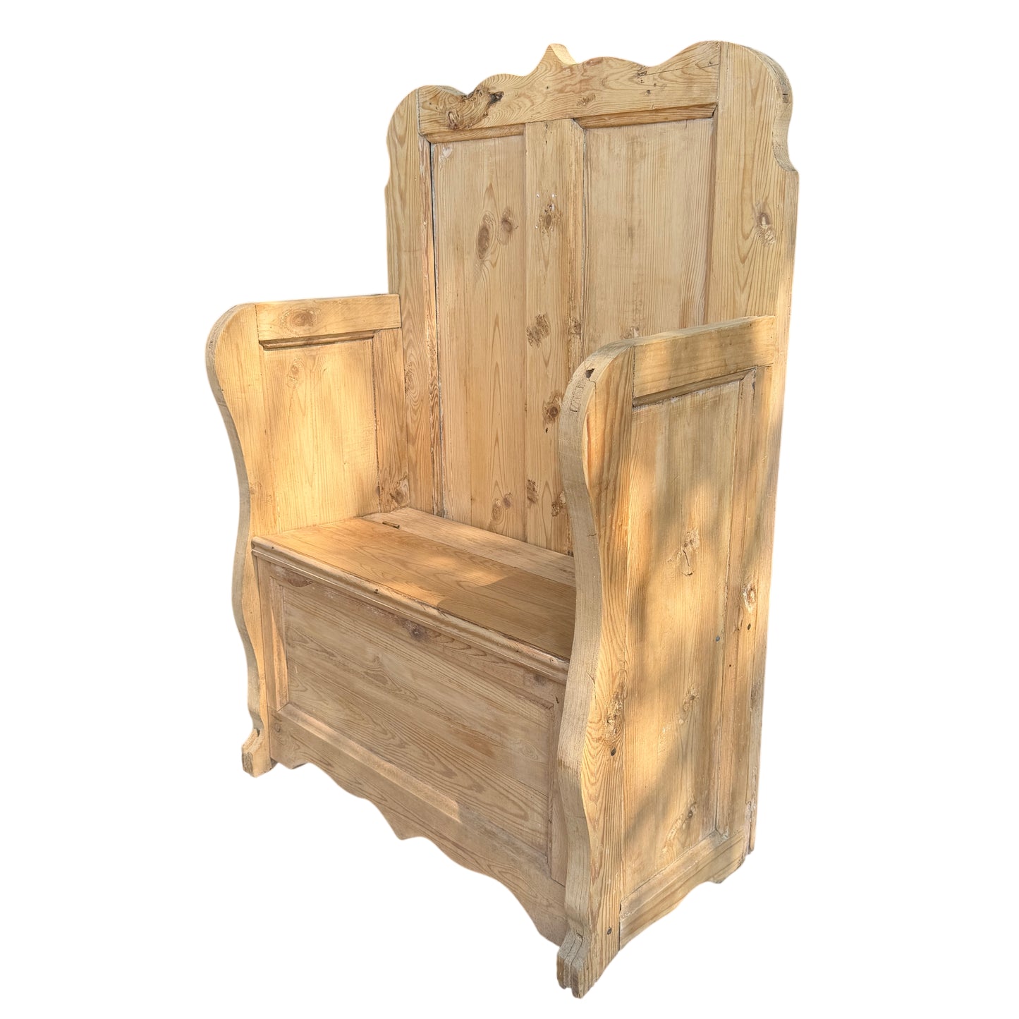 Side view of reclaimed pine bench showing curved arm and paneled construction