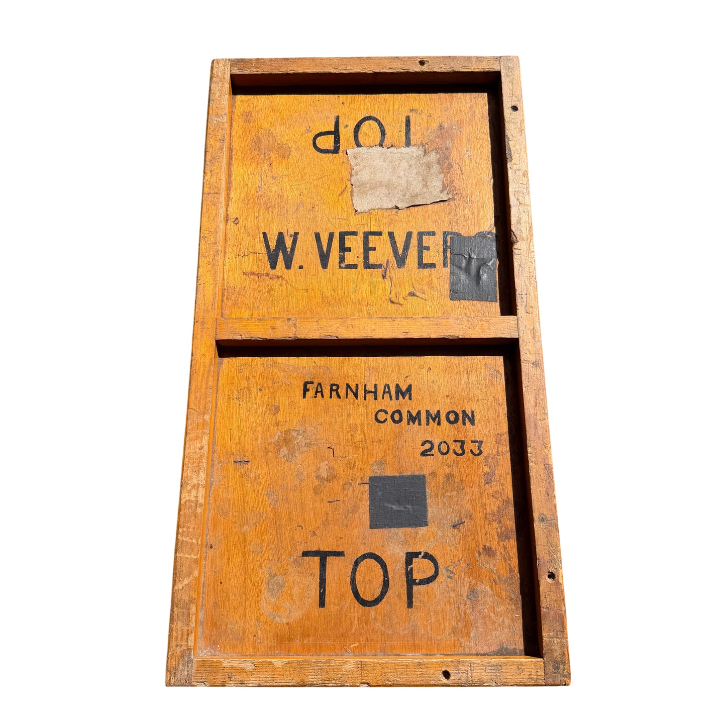 Rustic wooden crate storage chest showing edge wear and original markings