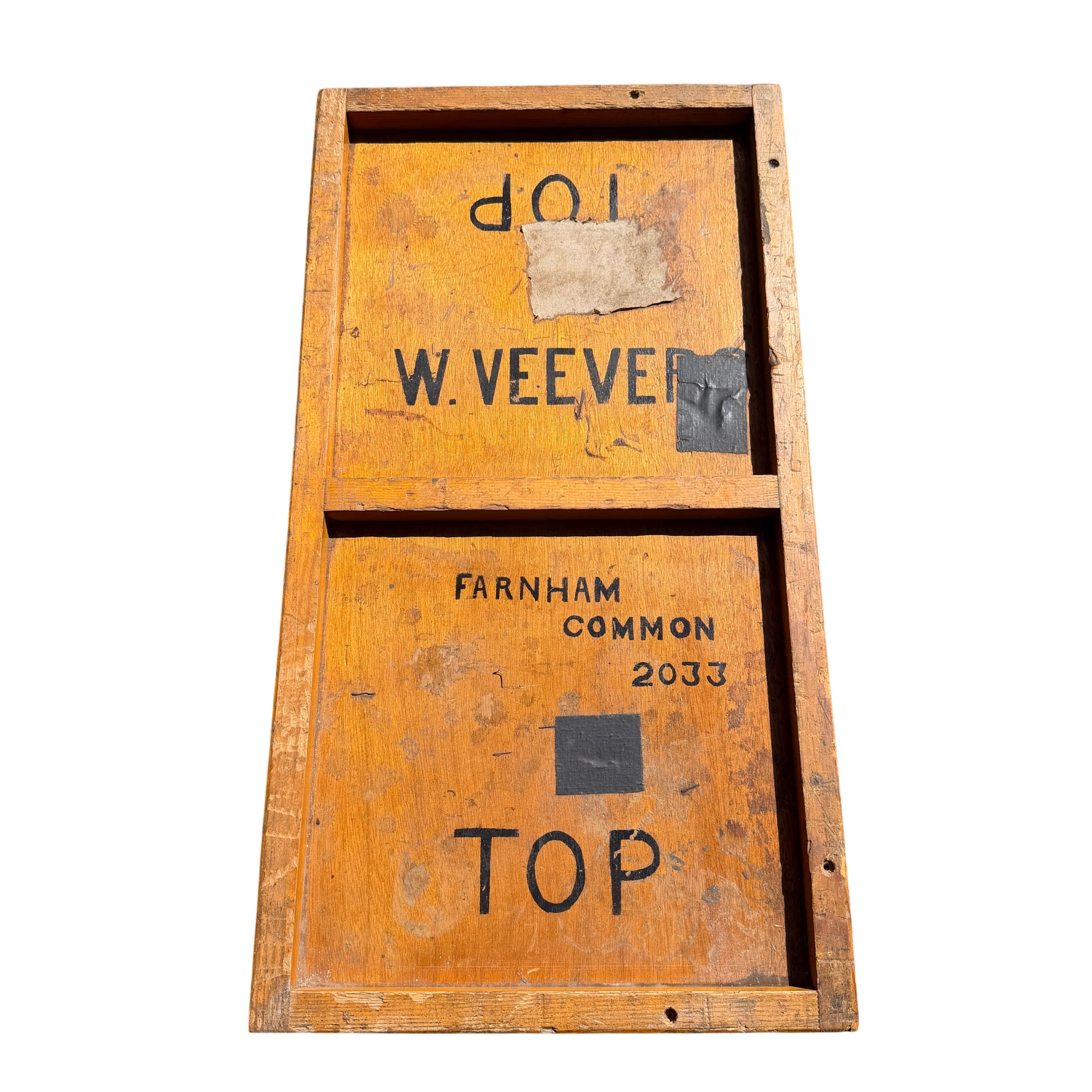 Rustic wooden crate storage chest showing edge wear and original markings