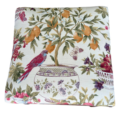 Rectangular upholstered stool seat in printed floral fabric on mahogany frame