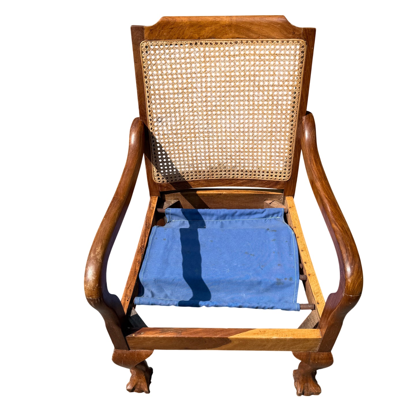 Close-up of cane weave on the back of a vintage armchair