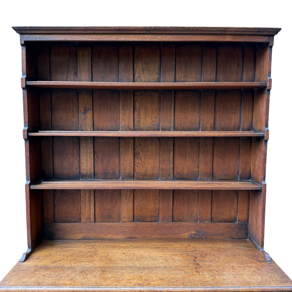 Detail of panelled oak back and fixed shelving on Arts & Crafts dresser