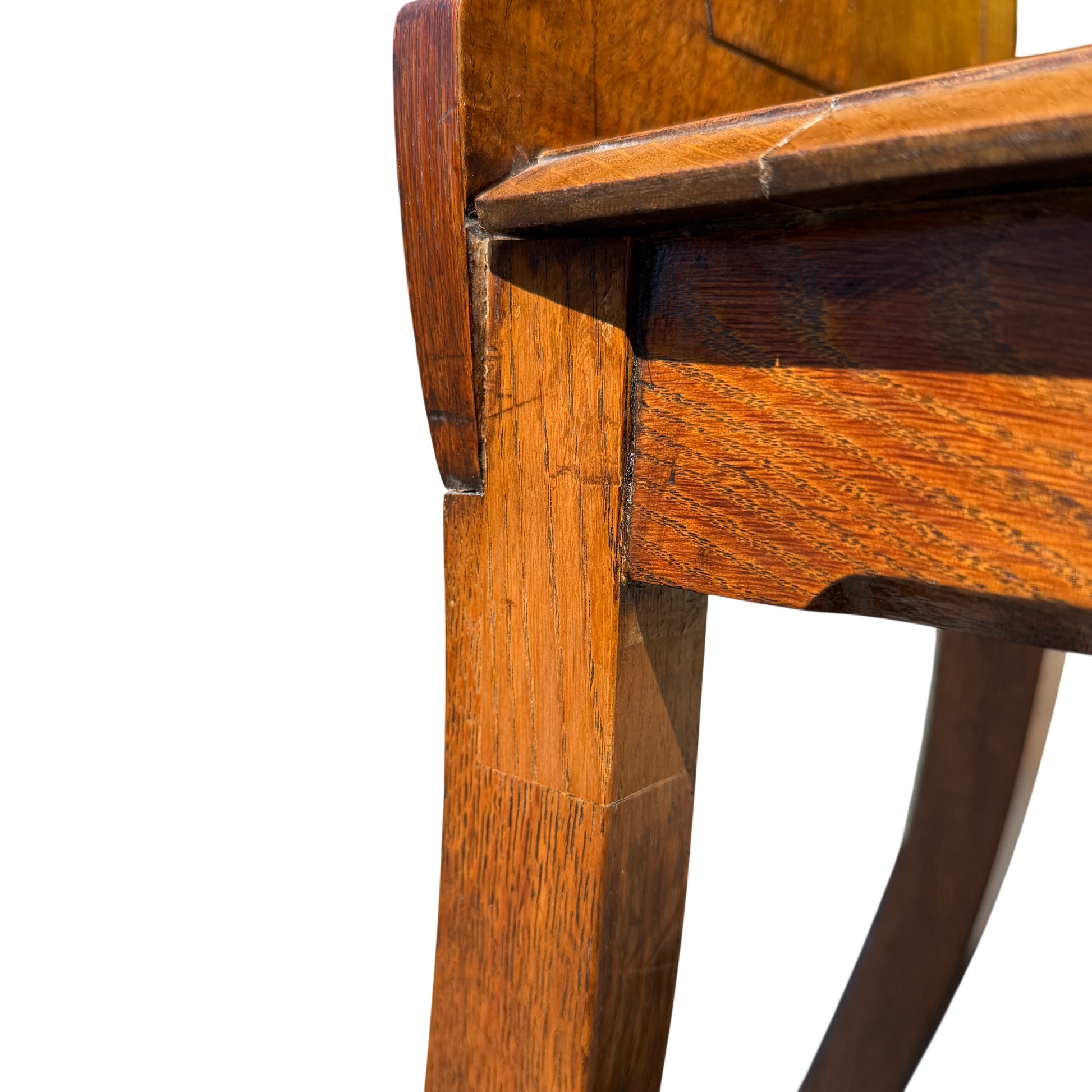 High angle shot of oak chair seat and top of turned legs