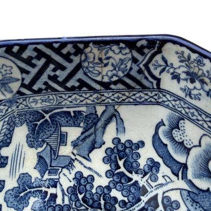 Interior composition showing pagoda, bridge and boat scene in blue transferware