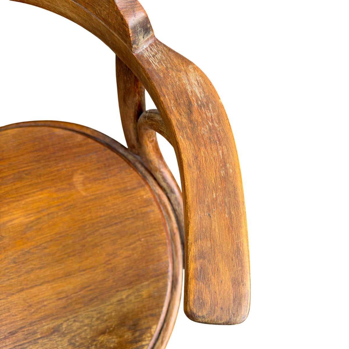 Close-up of arm/rail showing surface wear on a vintage bentwood chair