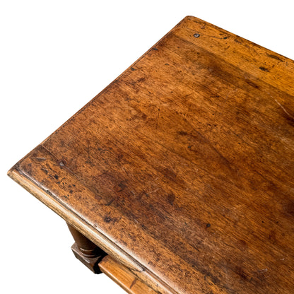 Under-stretcher and leg structure of a Victorian oak coffee table