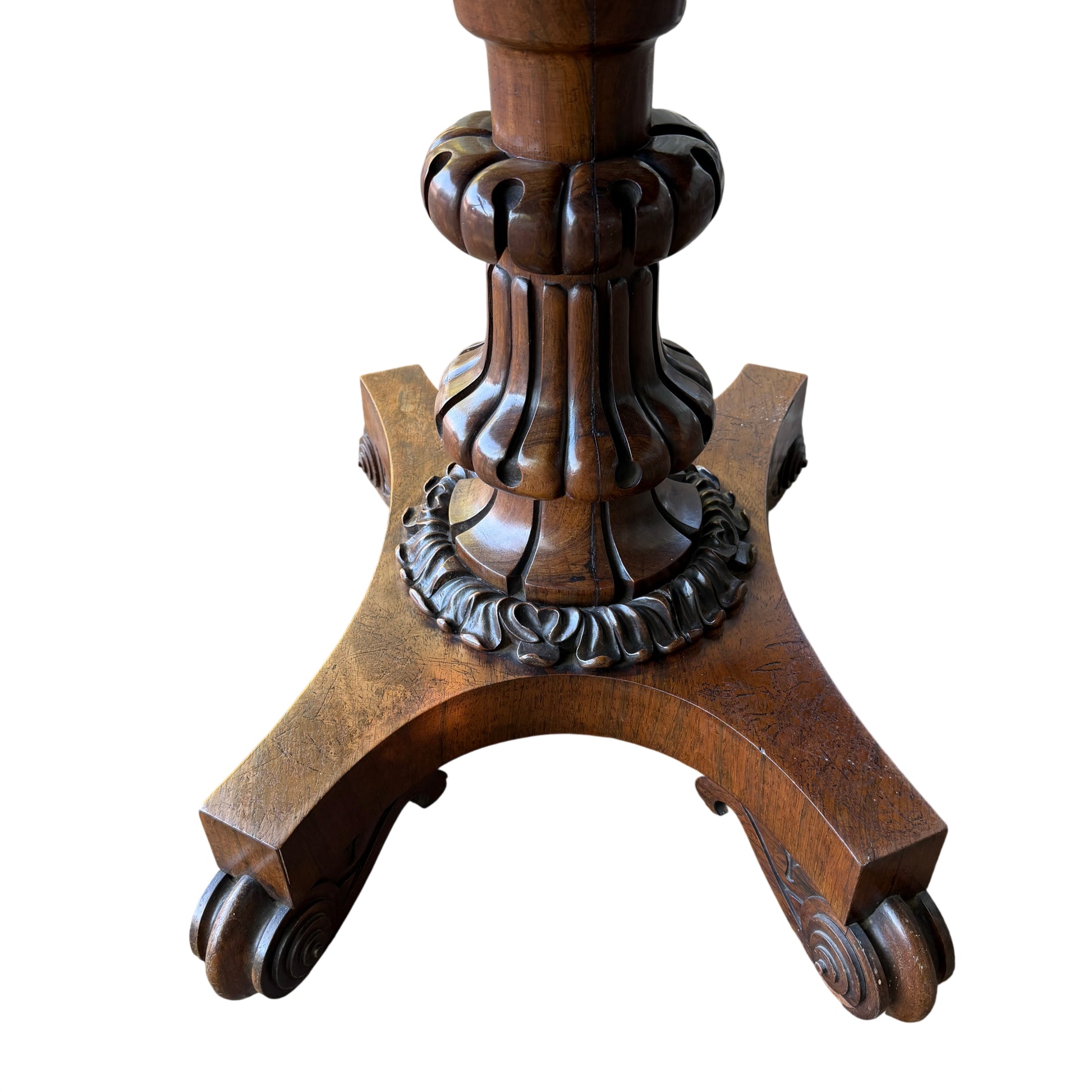 Carved turned pedestal base on Victorian rosewood hall table