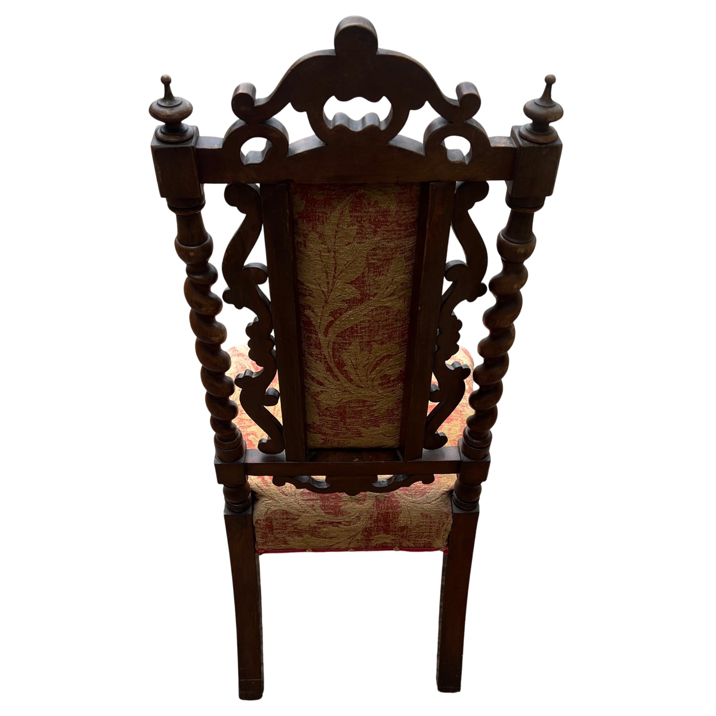 Close view of upholstery studs and floral tapestry pattern on high back chair