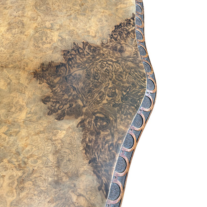 View across the table top showing removable tilt-top design and burr walnut veneer