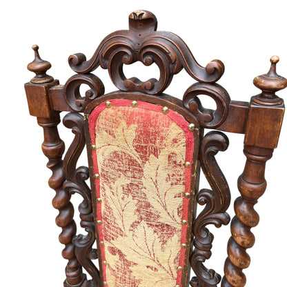 Detail of barley-twist turned upright and carved side splat on Victorian chair
