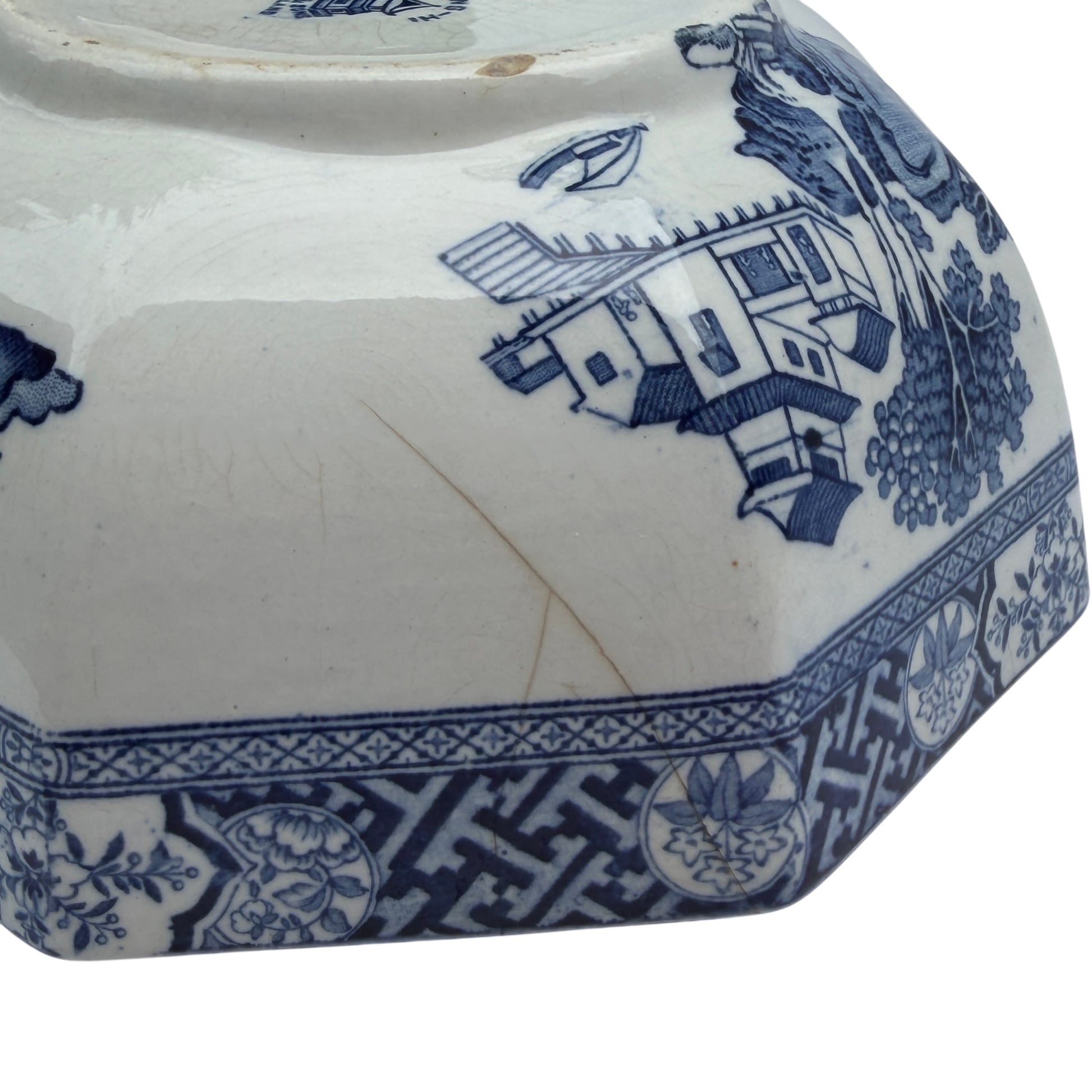 Close-up of footrim area of transferware bowl showing glaze and finish