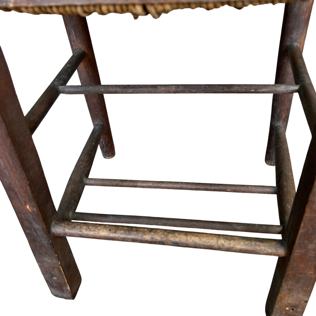 Woven rush seat pattern and corner detail on vintage chair