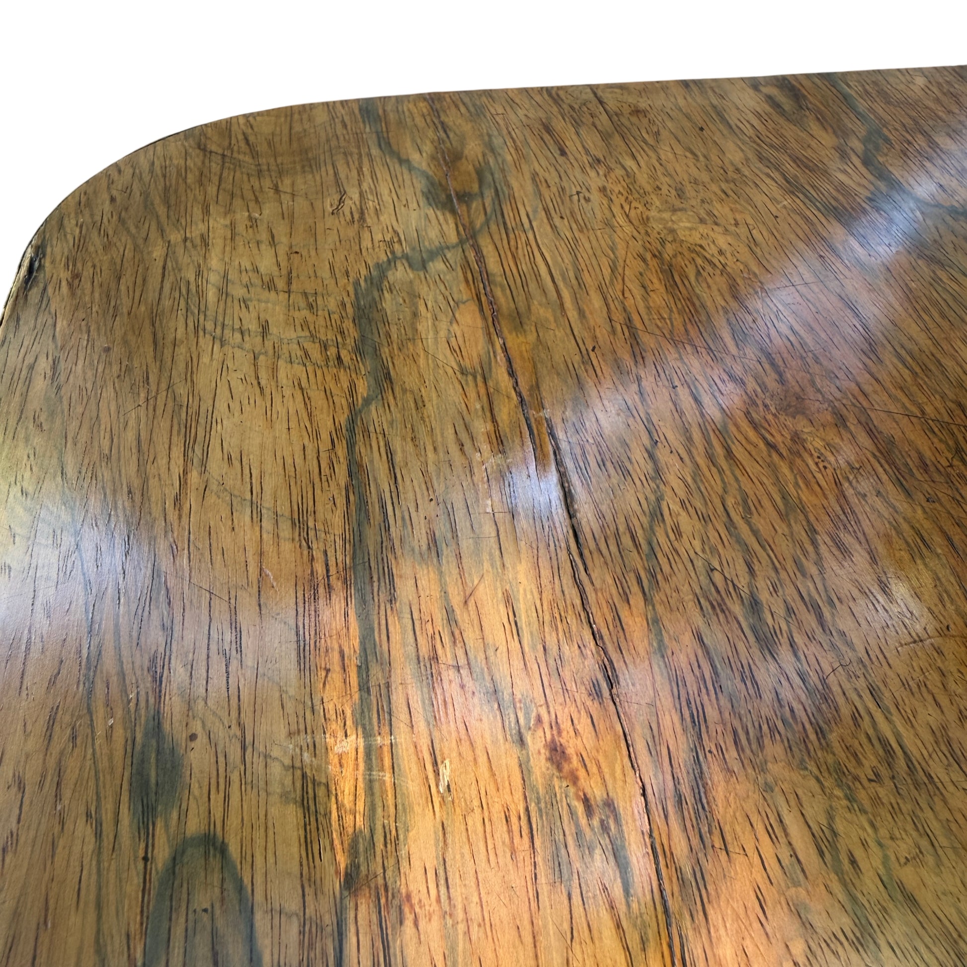 Green baize playing surface on antique swivel top card table