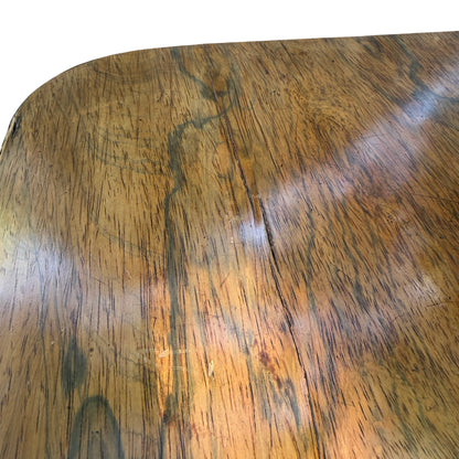 Green baize playing surface on antique swivel top card table