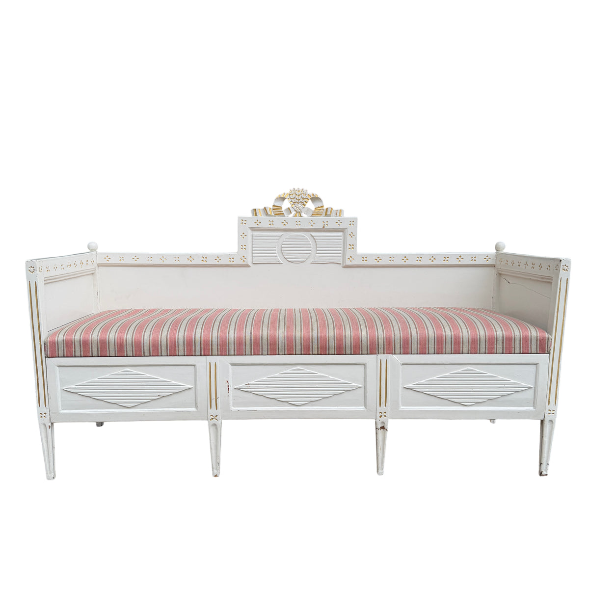 Painted wooden daybed with pull-out base and gilt highlights on carved crest