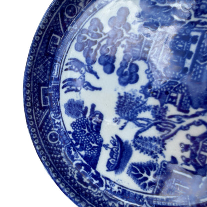 Blue and white Staffordshire butter pat dish with birds and trees