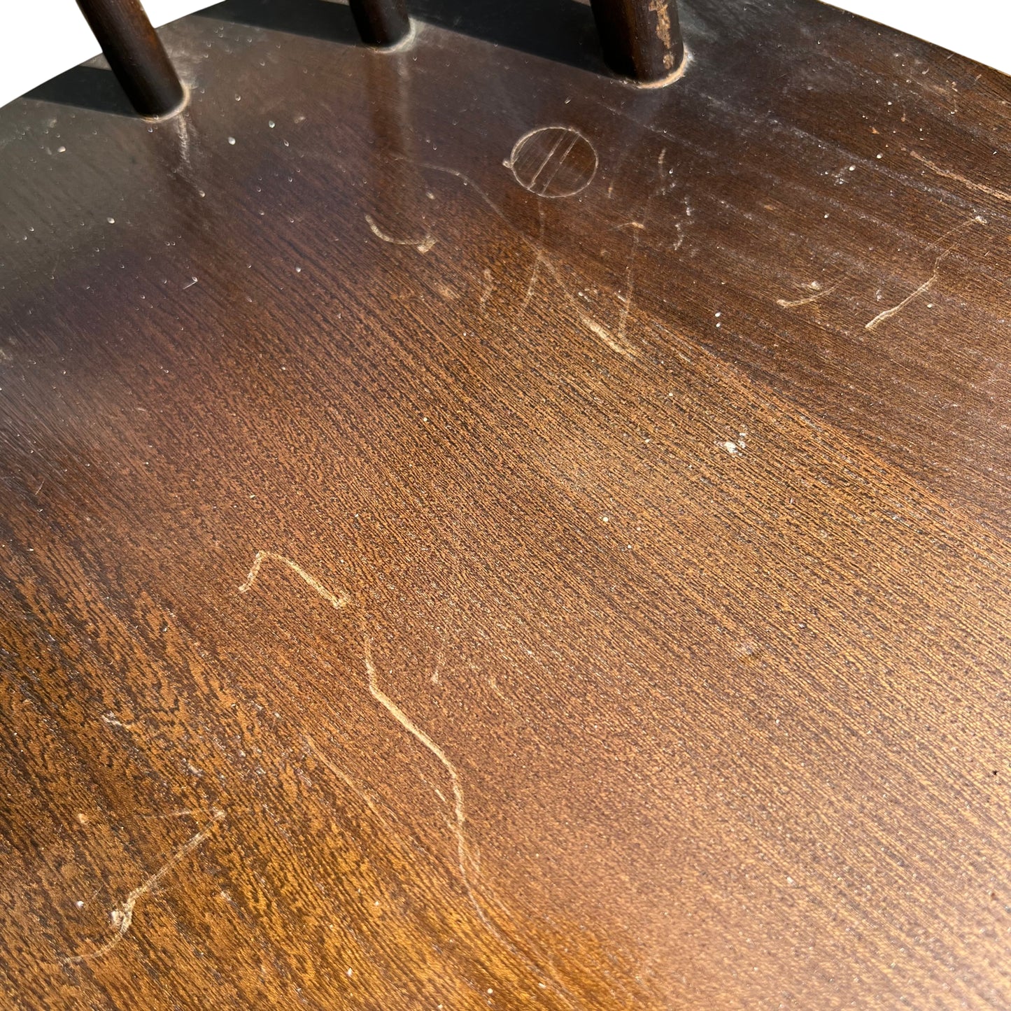 Top-down view of chair seat showing shaped edges and seating surface