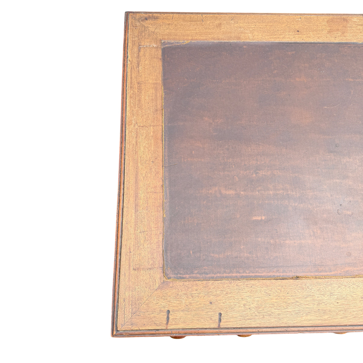 Left pedestal of mahogany desk showing stacked drawers and plinth base