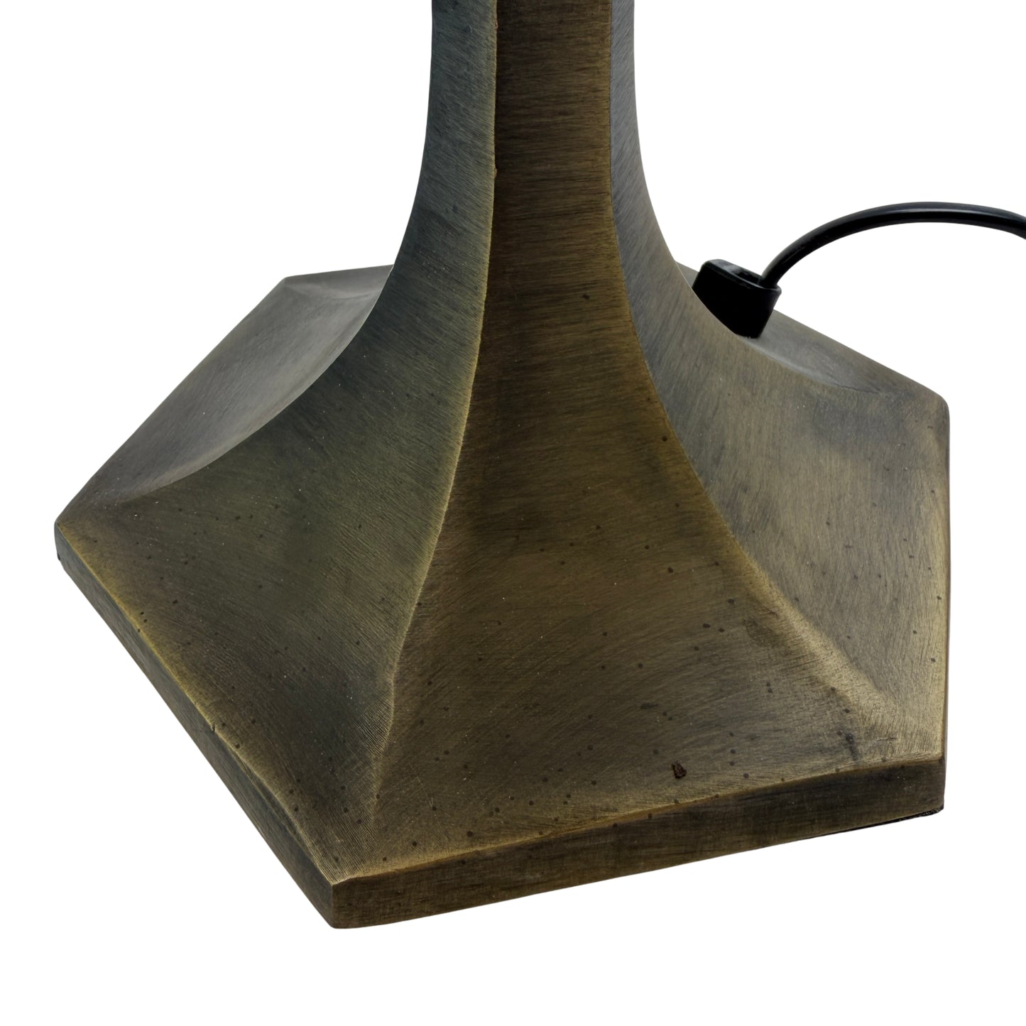 Close-up of cream glass panels and black lead came on a Tiffany-style table lamp