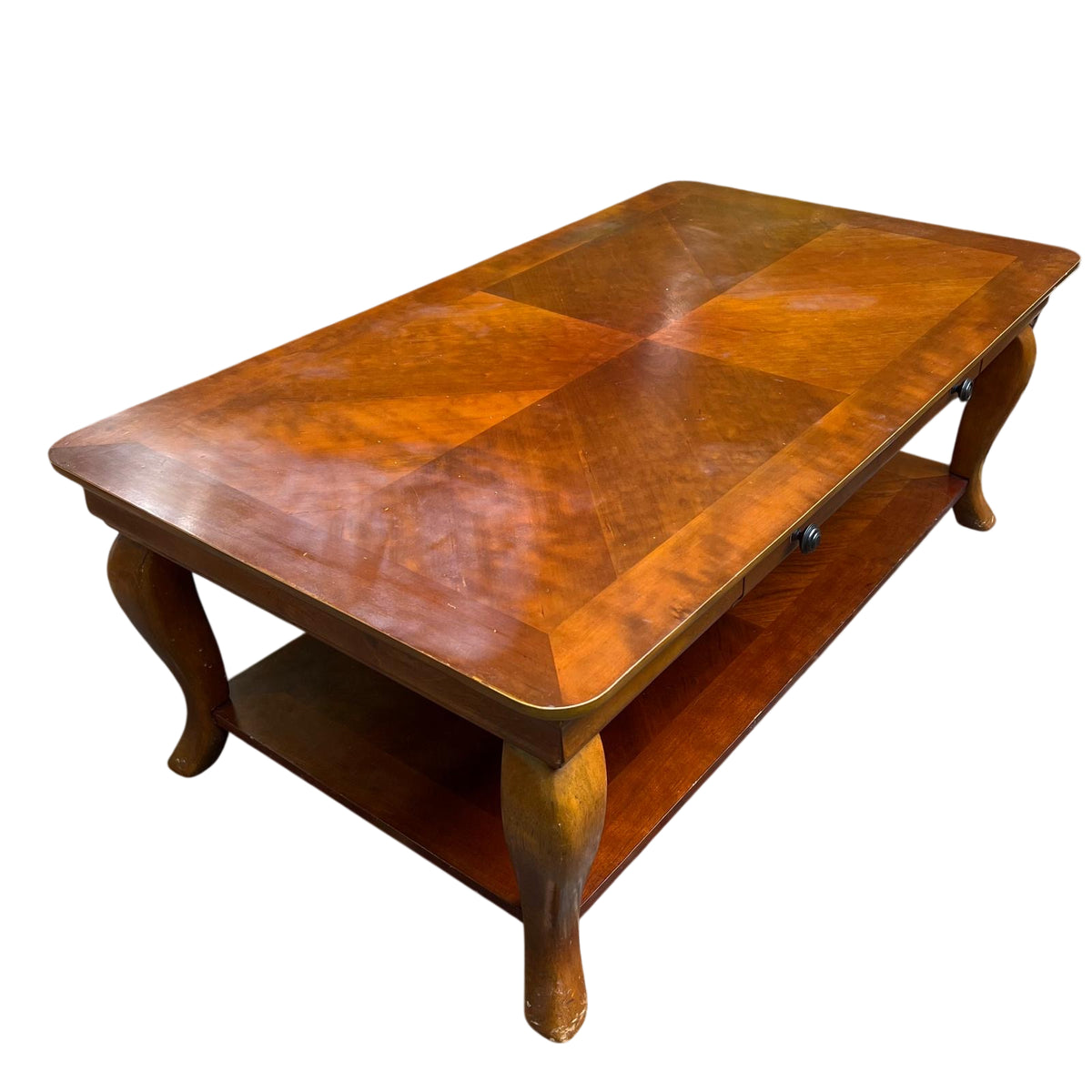 Vintage coffee table with rectangular wood-veneer top, lower shelf and single drawer in mid-century style