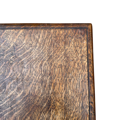 Under view showing stretcher and solid construction of oak side table