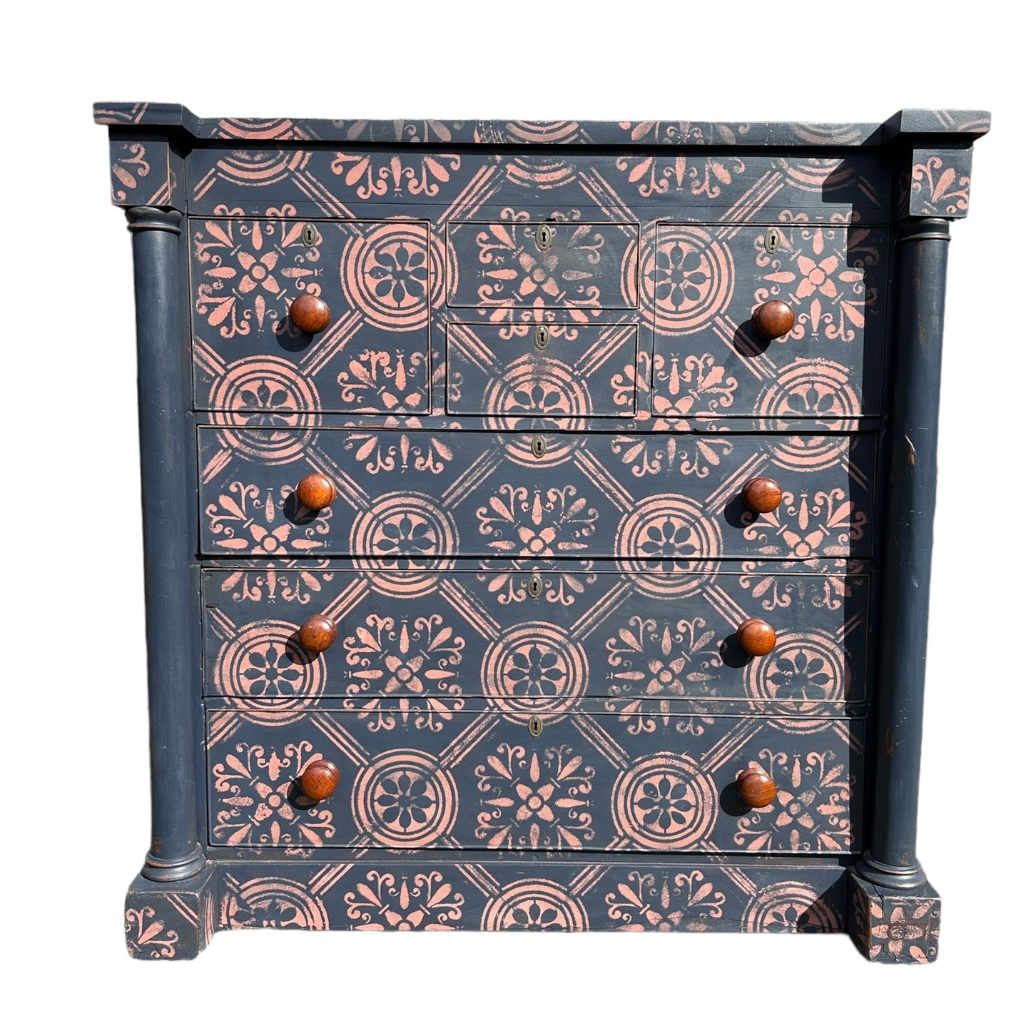 Large Victorian Chest of Drawers Painted Dark Blue With Pink Stencilled Detailing and Wooden HandlesThe Furniture Recycling Shop