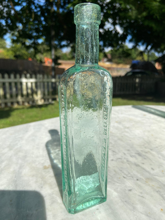 The Chasa Vogeler Co.Antique Aqua Green Glass Bottle - Vintage Glass BottleThe Furniture Recycling ShopBottle