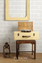 Load image into Gallery viewer, buttermilk cream lifestyle shot of a suitcase on a chair by fusion mineral paint
